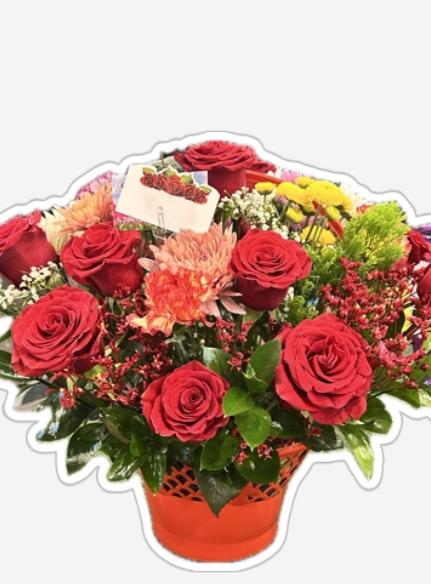 Roses, cushion, carnations, ruscu.baby breath, and a red basket